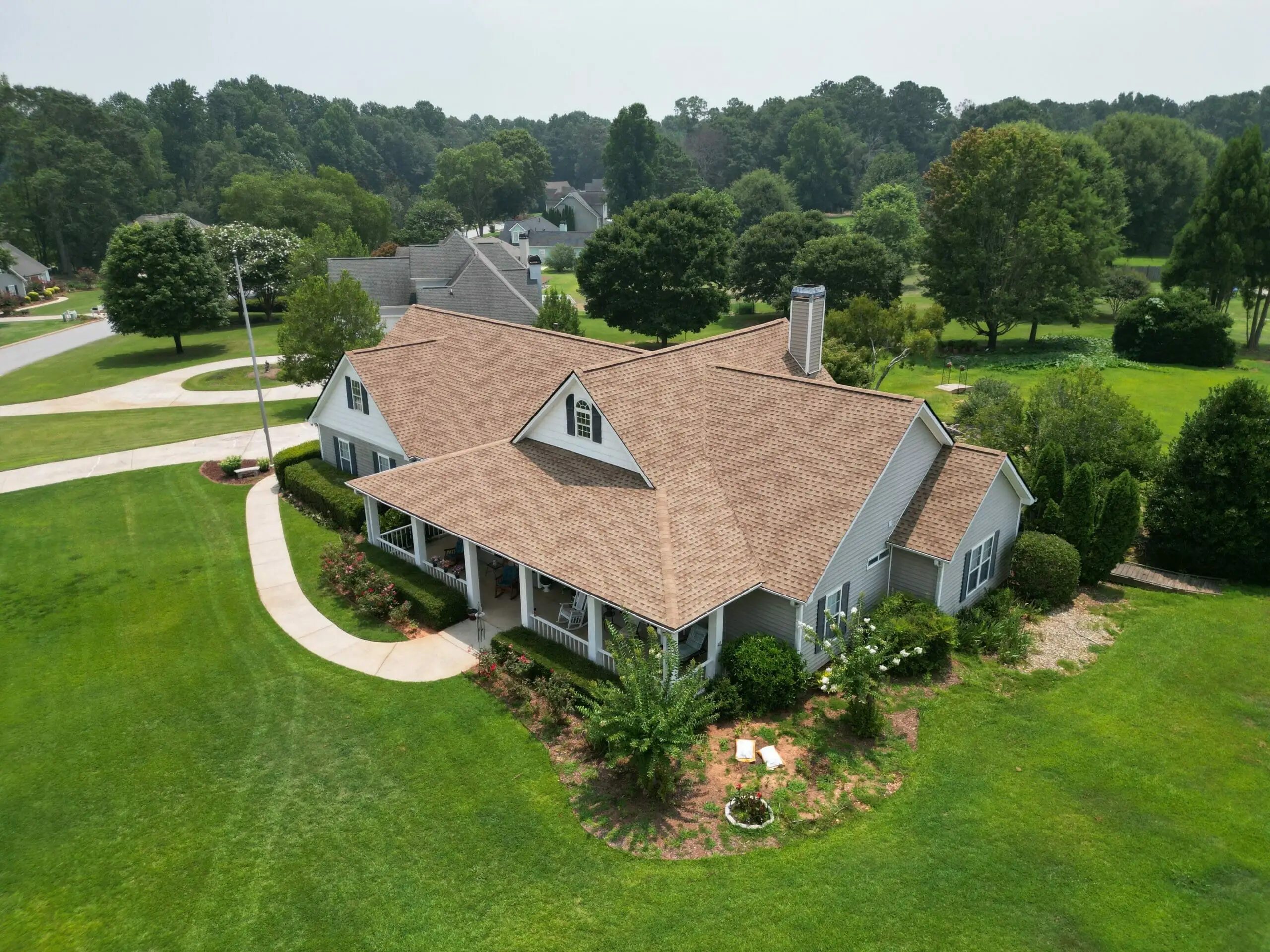 Aerial view of a residential roof installed by Hero Roofing in Newnan, GA