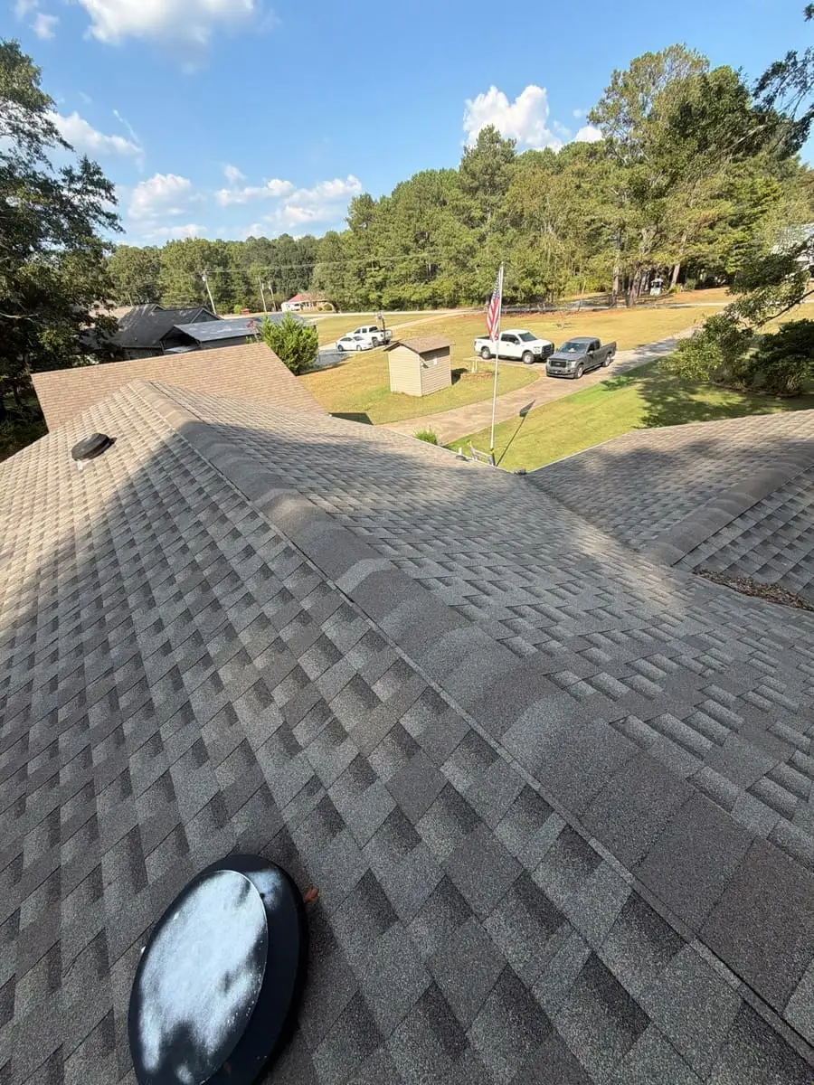Close view of new architectural shingles on a roof in Sharpsburg, GA