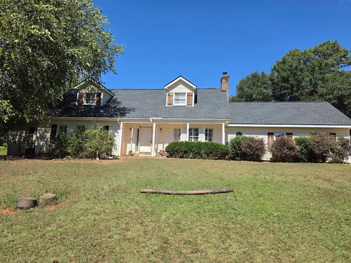 Gray shingle roof with dormers on a long single-story home in LaGrange, GA