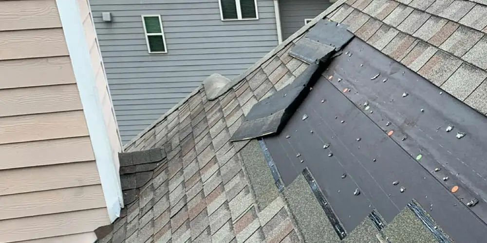Wind damage roof repair professionals in Newnan, GA